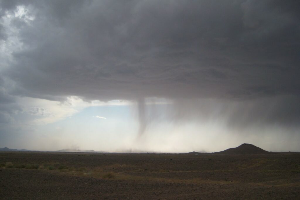 Met de camper naar Marokko - zandstorm in Erfoud